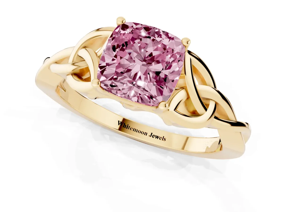 Fancy Pink Cushion Cut Diamond Solitaire Engagement Ring with Celtic Knot Band and Four-Prong Setting Yellow gold