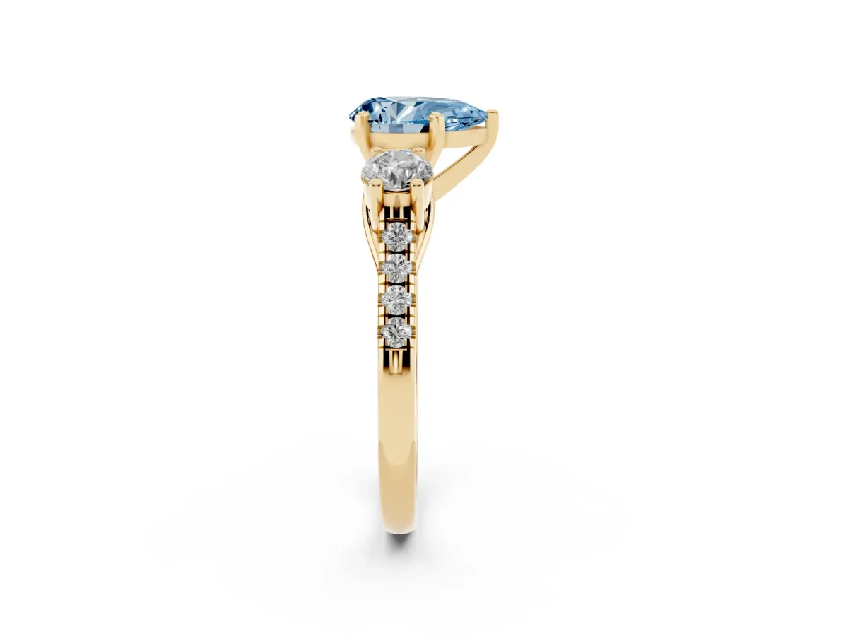 Fancy Blue Three-Stone Pear Cut Diamond Pavé Band with Four-Prong Setting Yellow gold