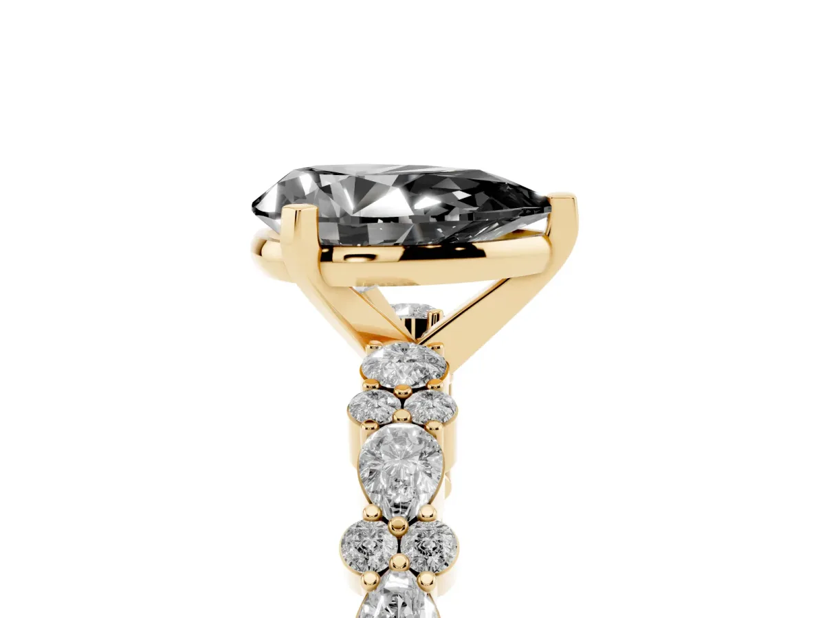 Fancy Black Pear Cut Diamond Side Stone Solitaire Ring with Round and Four-Prong Setting Yellow gold