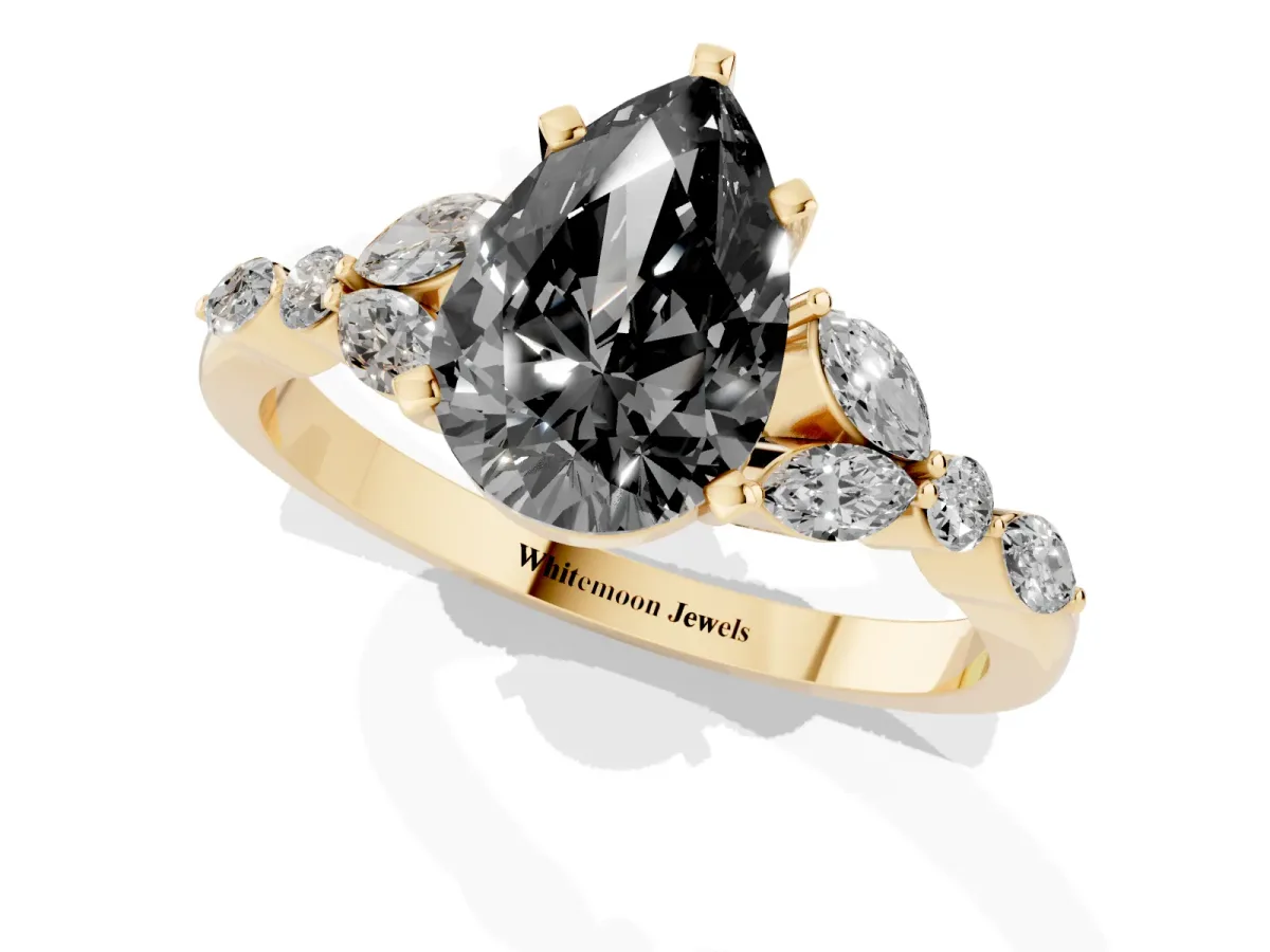 Fancy Black Pear Cut Diamond Solitaire Ring with Side Stones and Four-Prong Setting Yellow gold