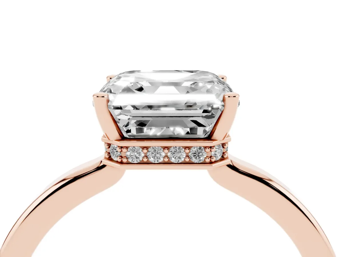 Asscher Cut Cut Solitaire Engagement Ring with Four-Prong Setting on a Classic Band Rose gold