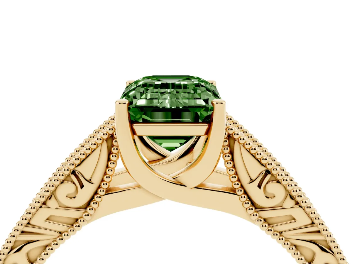 Fancy Green Emerald Cut Diamond Solitaire Ring with Engraved Band and Four-Prong Setting Yellow gold