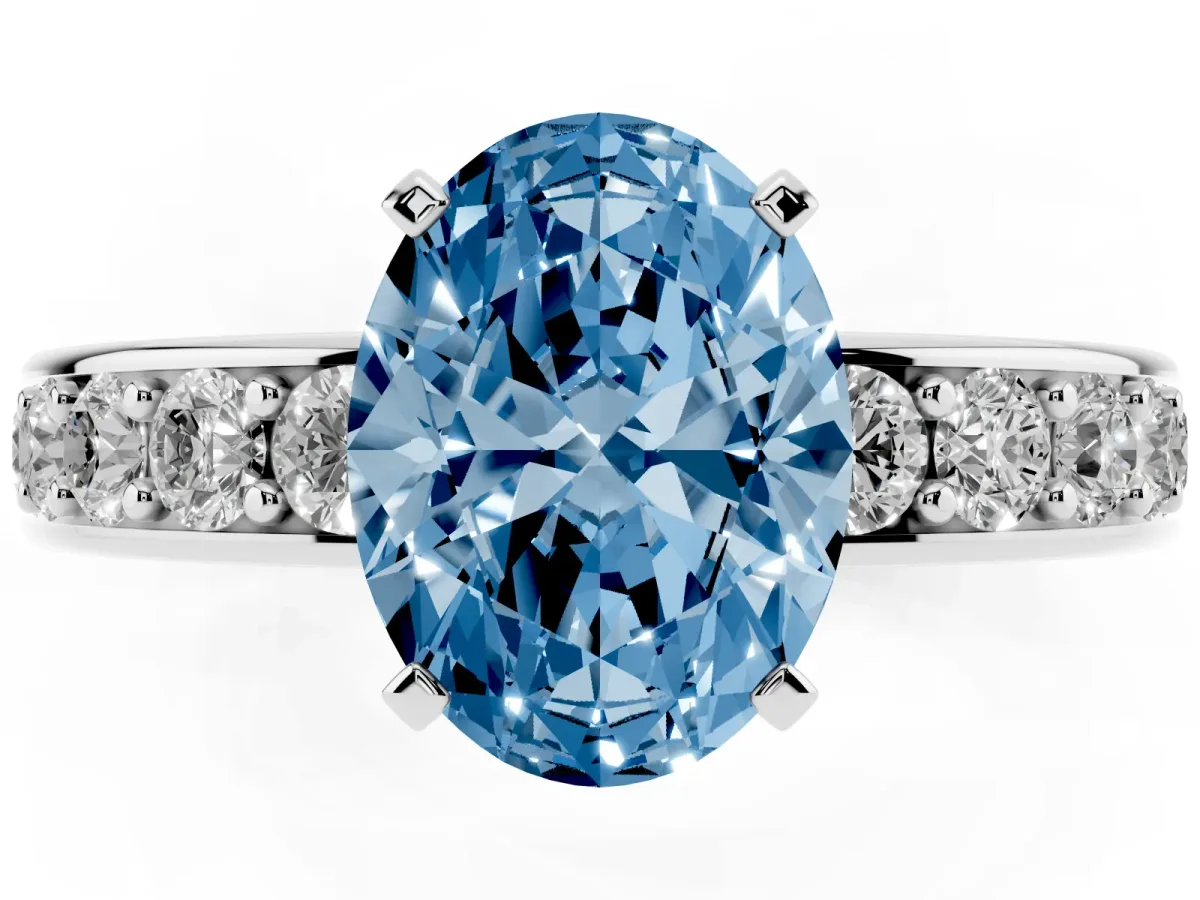 Fancy Blue Oval Cut Diamond Engagement Ring with Channel Set Round Band and Prong Setting Silver