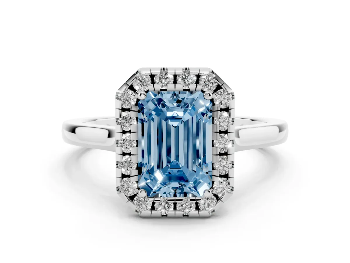 Fancy Blue Emerald Cut Halo Round Diamond Solitaire Ring with Pavé Band and Four-Prong Setting Silver