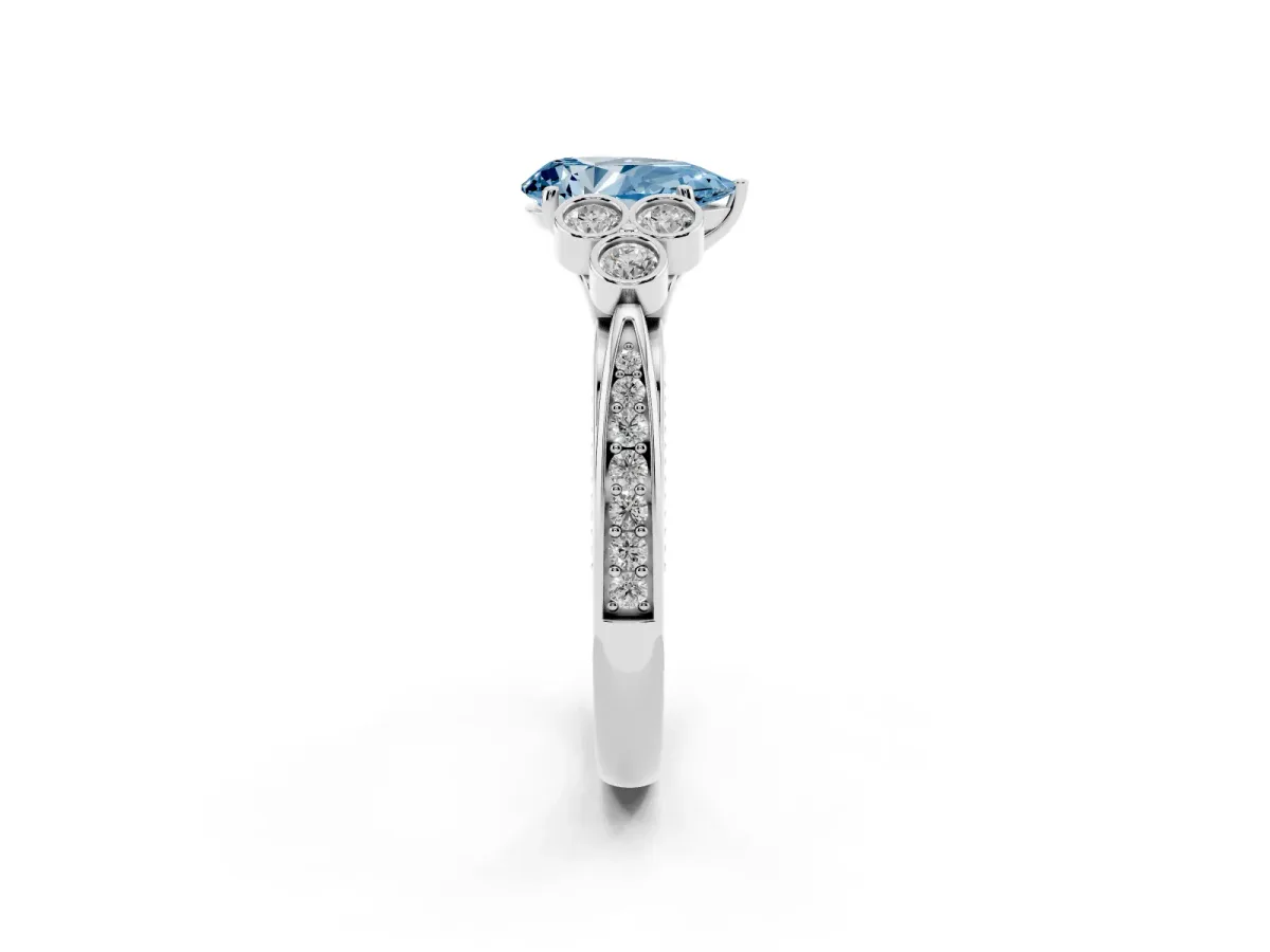 Fancy Blue Pear Cut Cut Diamond Engagement Ring with Bezel Set Round Side Stones and Prong Setting Silver