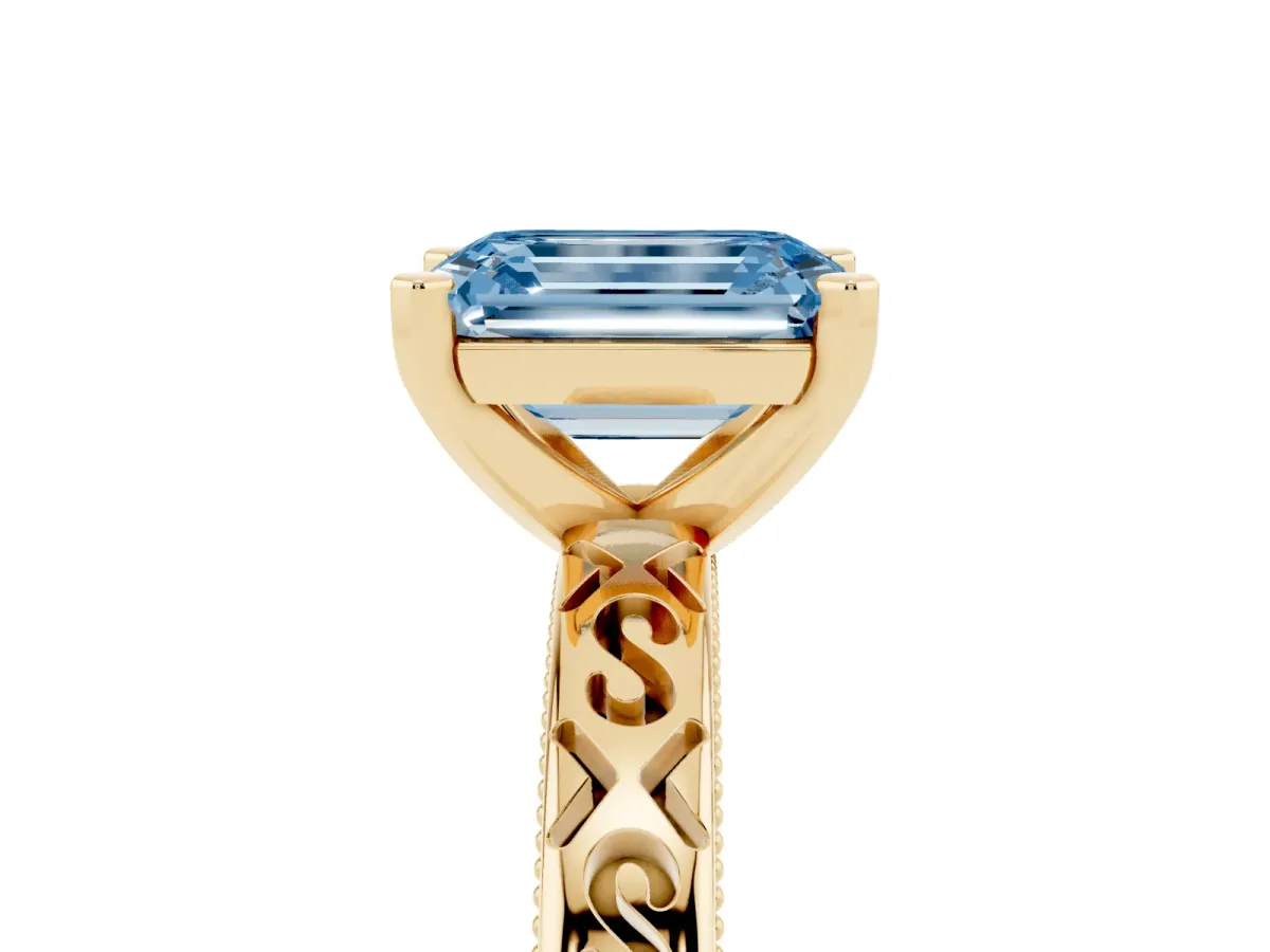 Fancy Blue Emerald Cut Solitaire Engagement Ring with Scrollwork Band and Four-Prong Setting Yellow gold