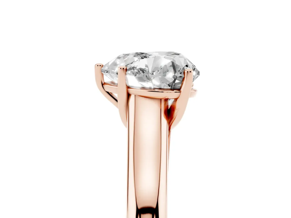 Heart Cut Cut Diamond Solitaire Engagement Ring with Tapered Plain Band and Four-Prong Setting Rose gold
