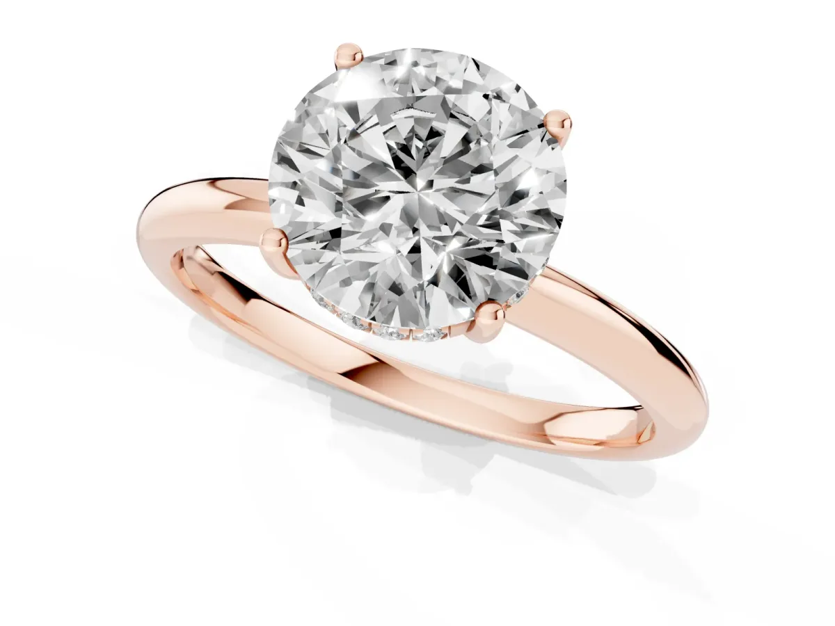 Round Cut Cut Solitaire Engagement Ring with Four-Prong Setting and Classic Band Rose gold