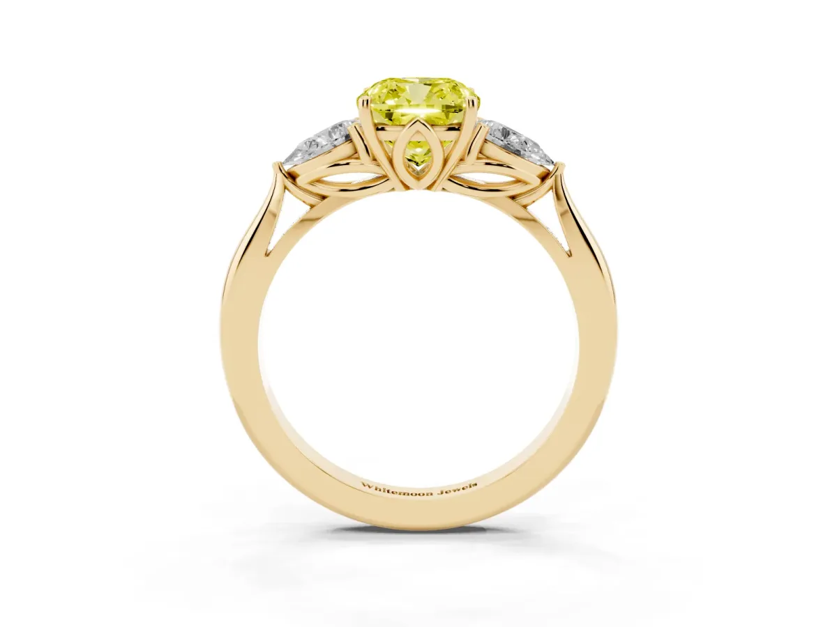 Fancy Yellow Three-Stone Cushion Cut Diamond Ring with Pear Side Stones in Four-Prong Setting Yellow gold