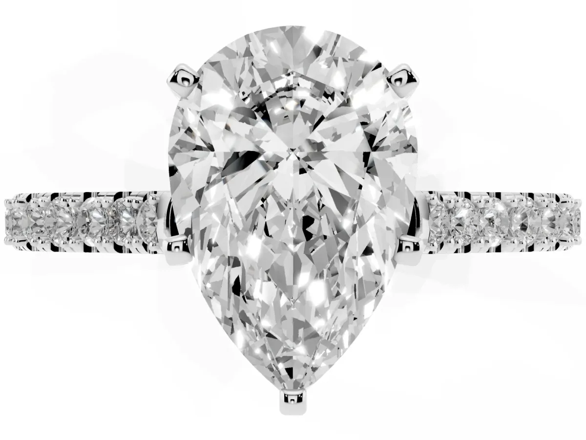 Pear Cut Cut Solitaire Diamond Engagement Ring with Pave Band and Four-Prong Setting Platinum