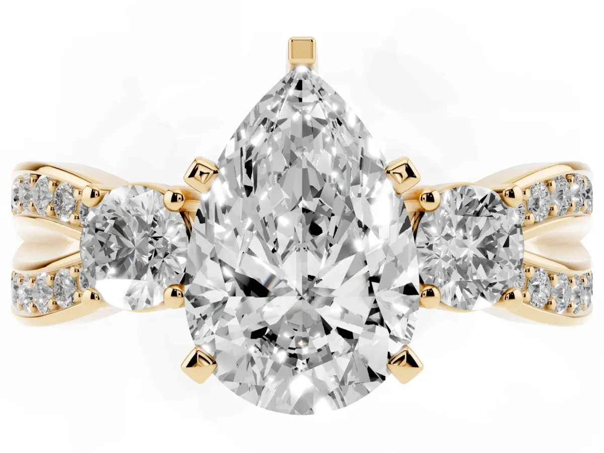 Three-Stone Pear Cut Cut Diamond Twist Band with Prong Setting Yellow gold