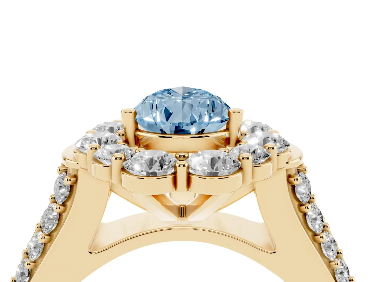 Fancy Blue Pear Cut Halo Diamond Engagement Ring with Split Shank and Prong Setting Yellow gold