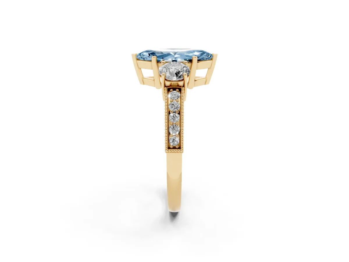 Fancy Blue Marquise Cut Three-Stone Diamond Ring with Pavé Band and Four-Prong Setting Yellow gold