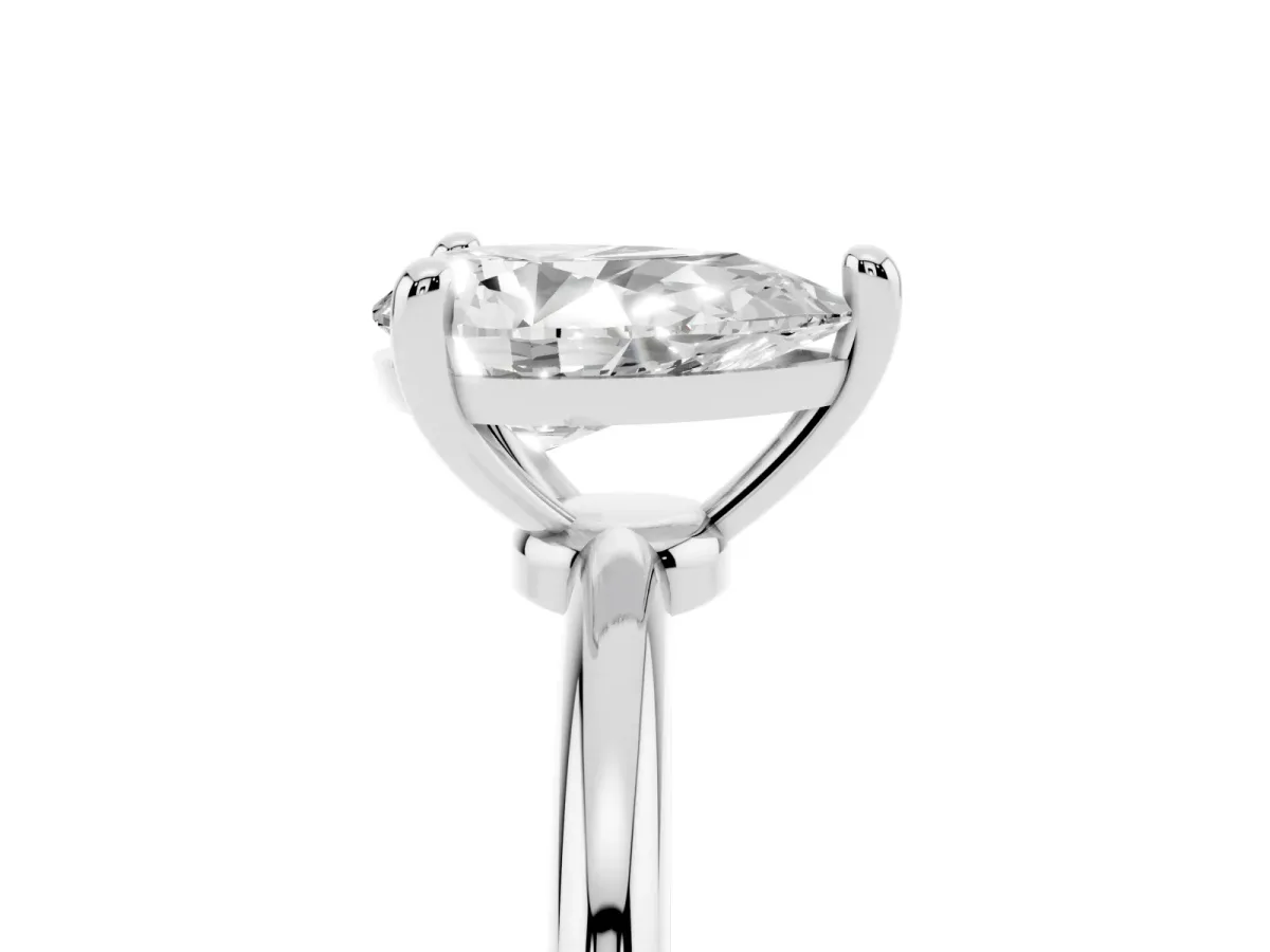 Pear Cut Solitaire Diamond Ring with 4-Prong Setting on a Classic Band White gold