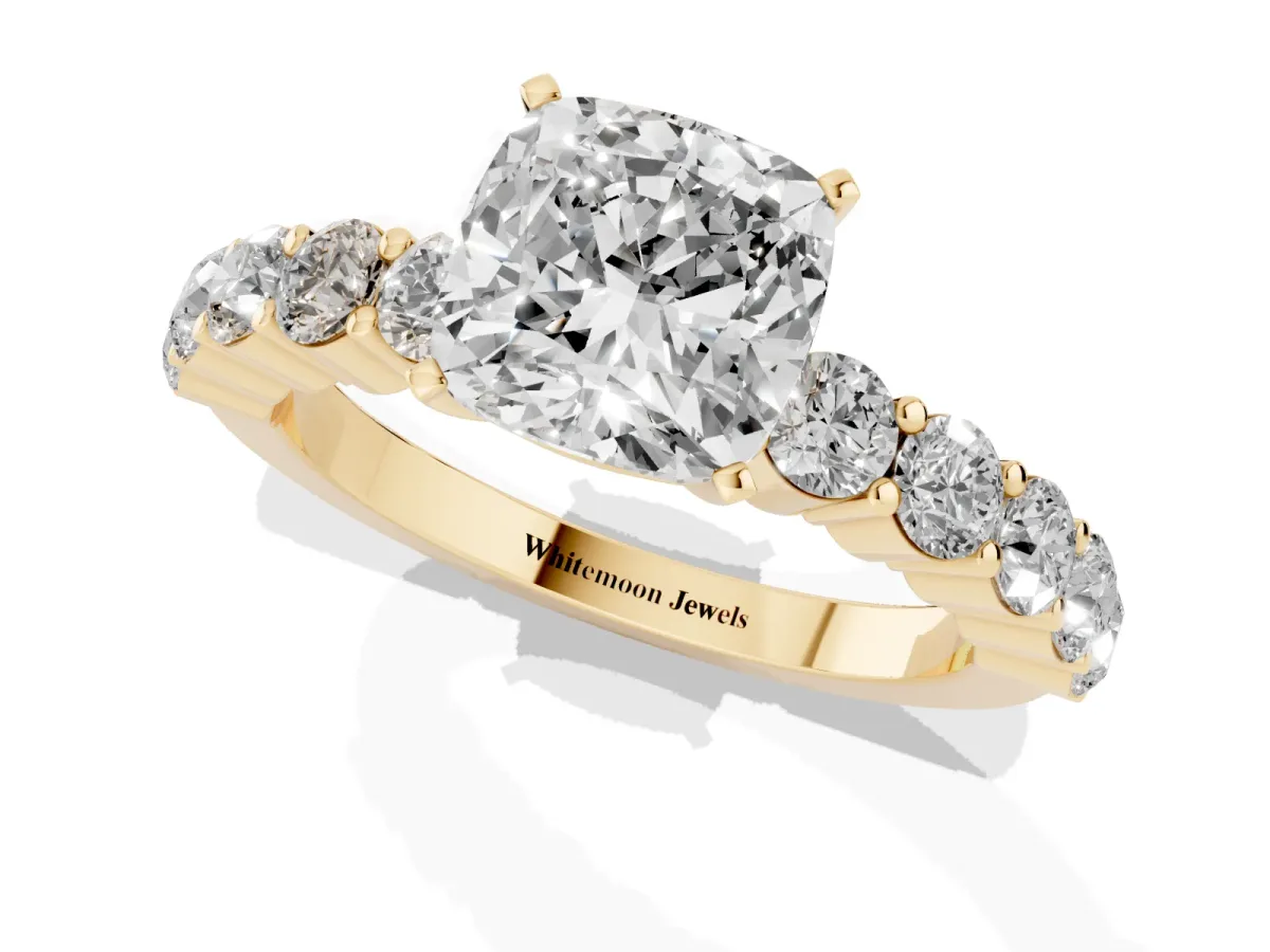 Cushion Cut Diamond Solitaire Ring with Shared Prong Round Side Stones Yellow gold