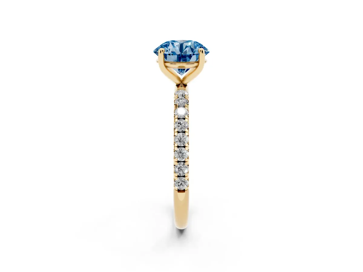 Fancy Blue Round Cut Cut Diamond Solitaire Ring with Micro Pave Band and Four Prong Setting Yellow gold