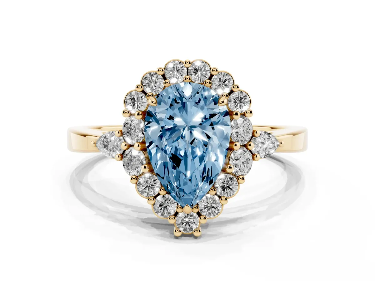 Fancy Blue Pear Cut Diamond Halo Ring with Pear Side Stones and Prong Setting Yellow gold