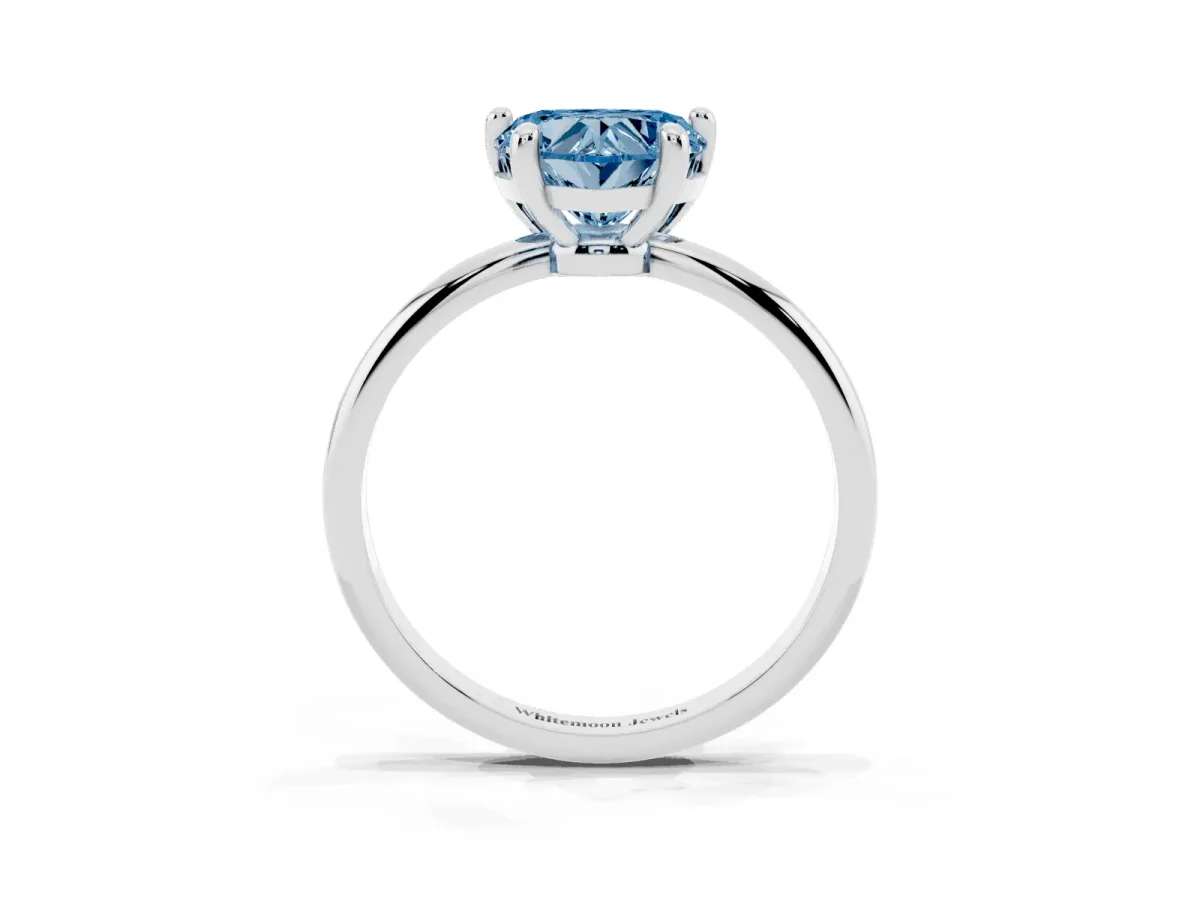 Fancy Blue Heart Cut Solitaire Diamond Ring with 4-Prong Setting on a Classic Band Silver