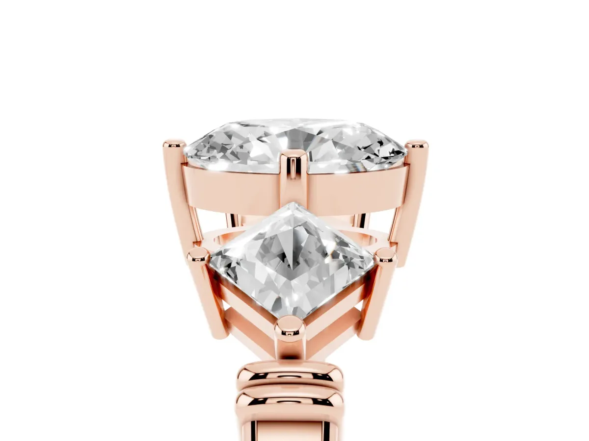Three-Stone Oval Cut and Princess Cut Diamond Ring with Channel Band and Four-Prong Setting Rose gold