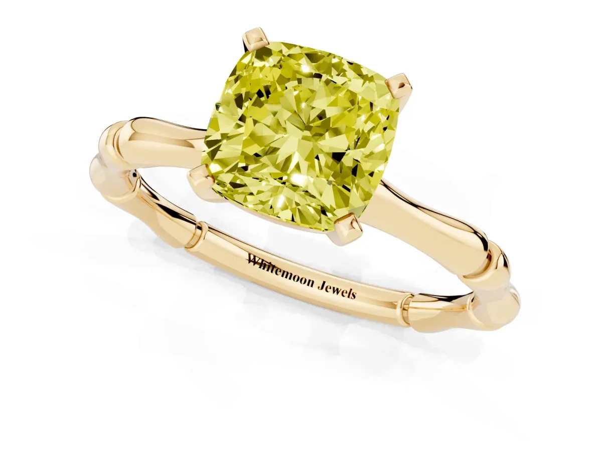 Fancy Yellow Cushion Cut Solitaire Diamond Ring with Bamboo Band and Four-Prong Setting Yellow gold