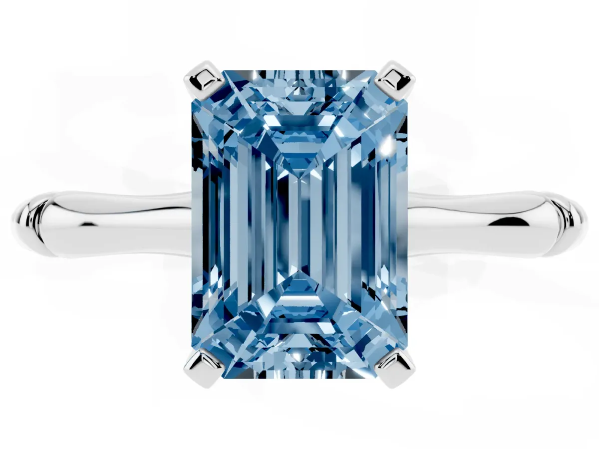 Fancy Blue Emerald Cut Solitaire Diamond Ring with Bamboo Band and Four-Prong Setting Platinum