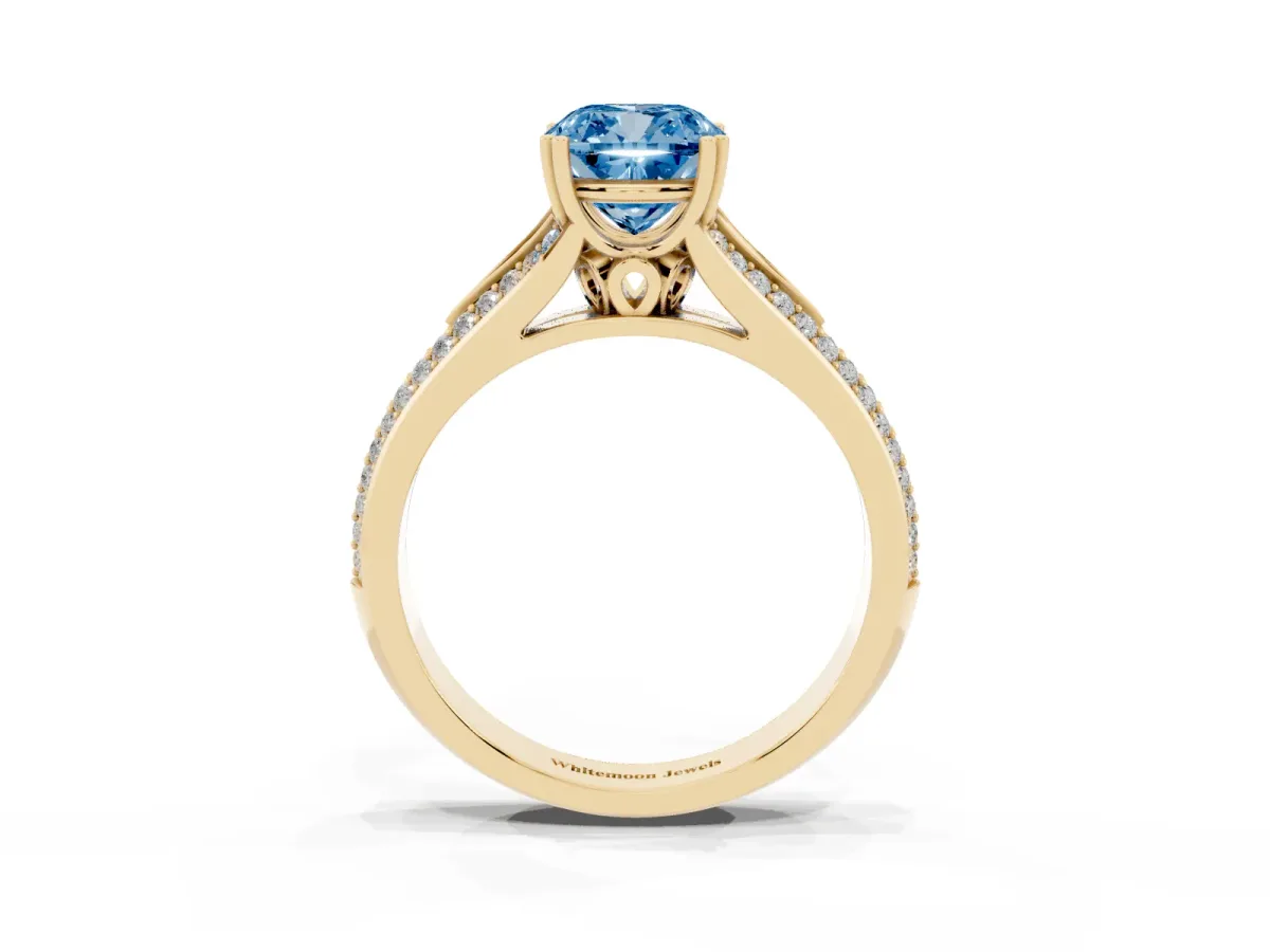 Fancy Blue Cushion Cut Diamond Split Shank Engagement Ring with Pavé Band Yellow gold