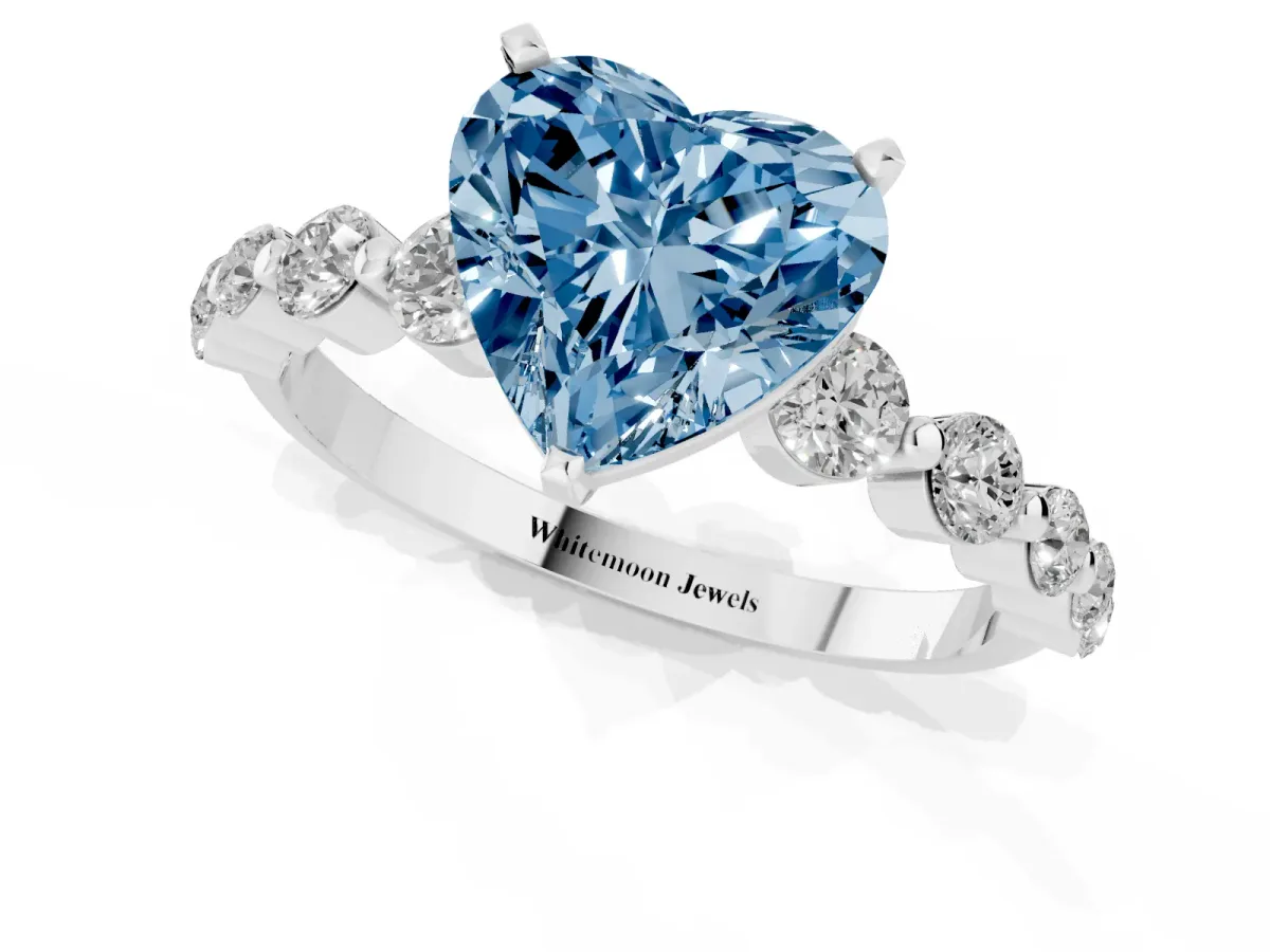 Fancy Blue Heart Cut Solitaire Diamond Ring with Pave Band and Four-Prong Setting Silver