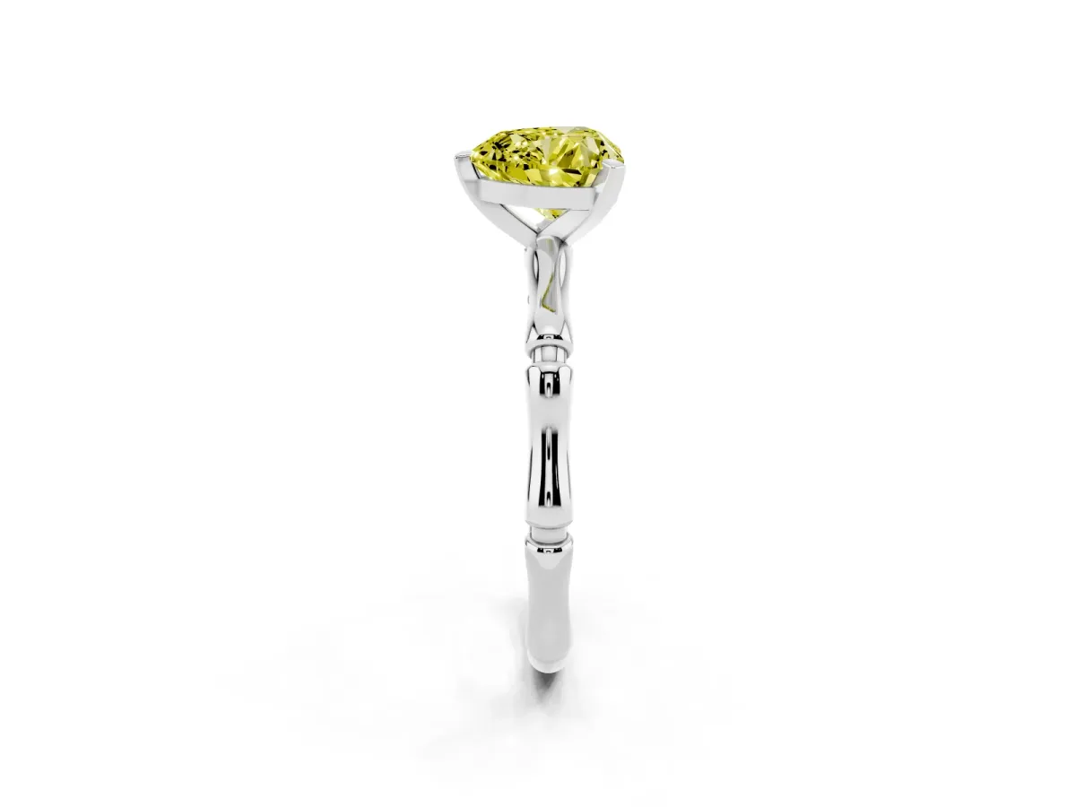 Fancy Yellow Heart Cut Solitaire Diamond Ring with Bamboo Band and Four-Prong Setting Silver