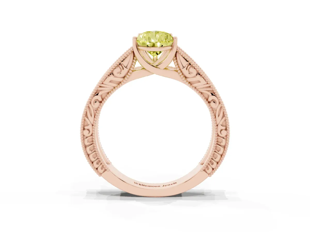 Fancy Yellow Pear Cut Diamond Solitaire Ring with Engraved Band and Four-Prong Setting Rose gold