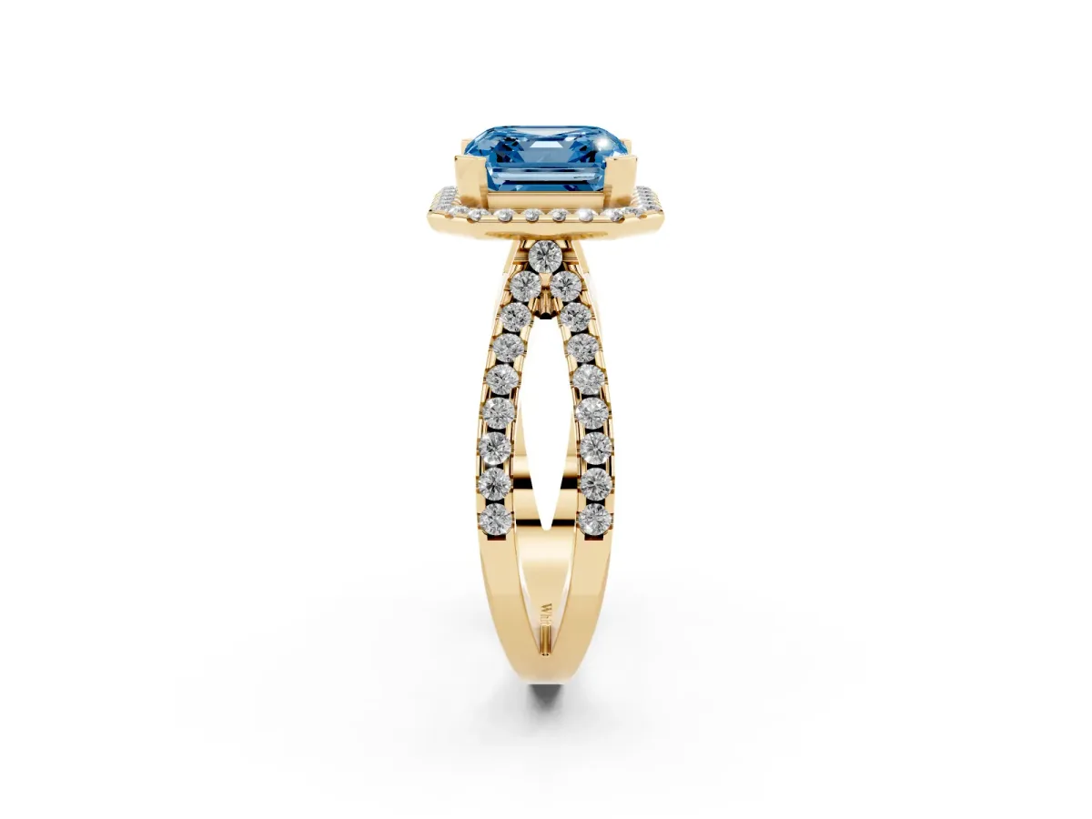 Fancy Blue Asscher Cut Diamond Halo Ring with Split Shank Pavé Band and Prong Setting Yellow gold