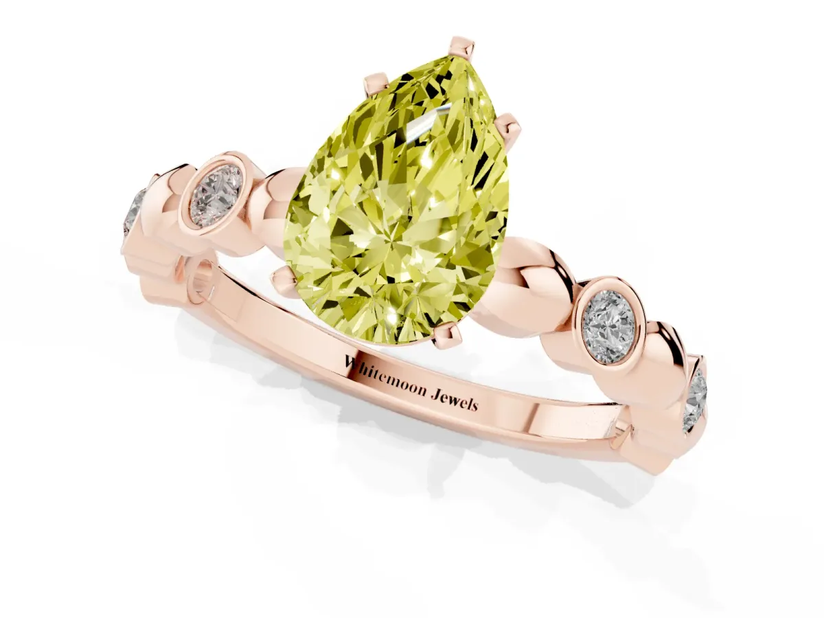 Fancy Yellow Pear Cut Solitaire Bezel-Set Diamond Ring with Beaded Band and Four-Prong Setting Rose gold