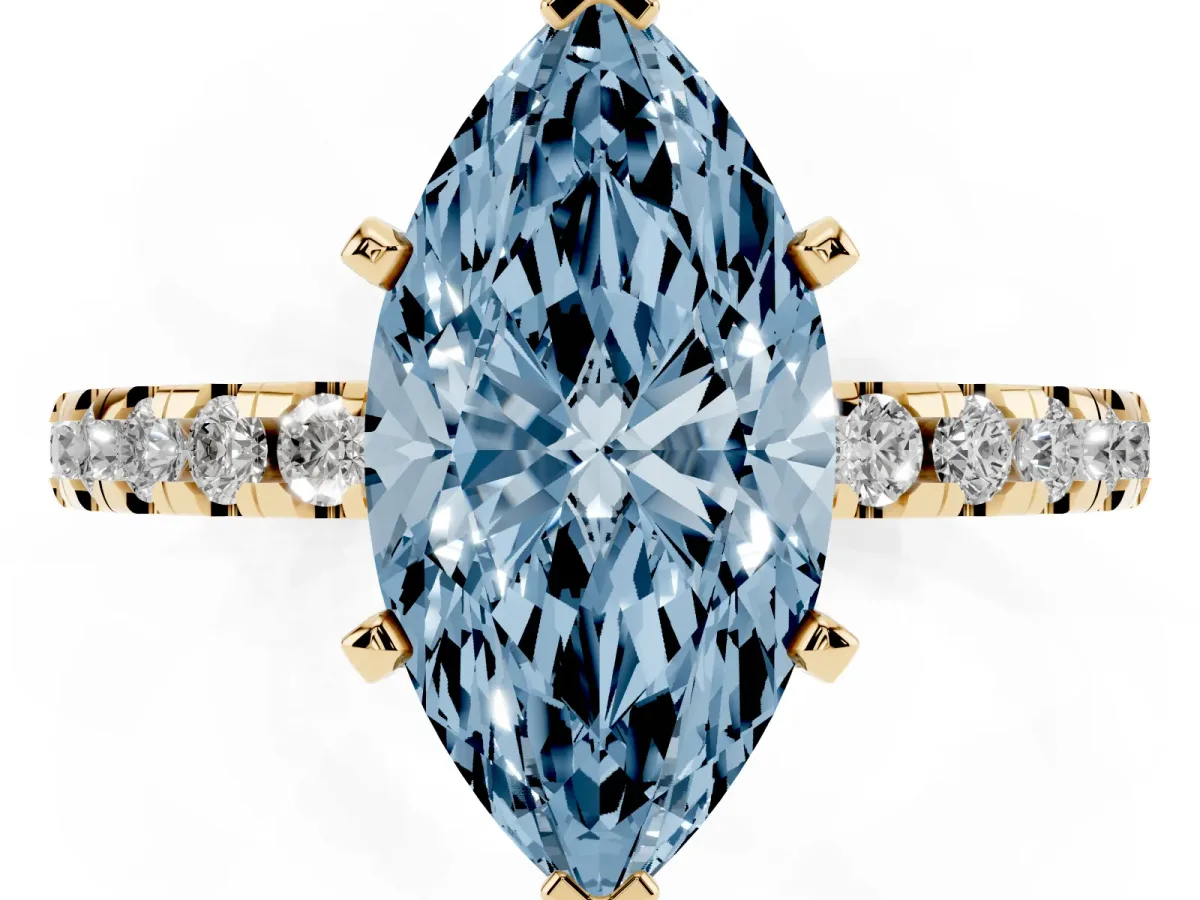 Fancy Blue Marquise Cut Diamond Solitaire Ring with Round Pavé Band and Four-Prong Setting Yellow gold