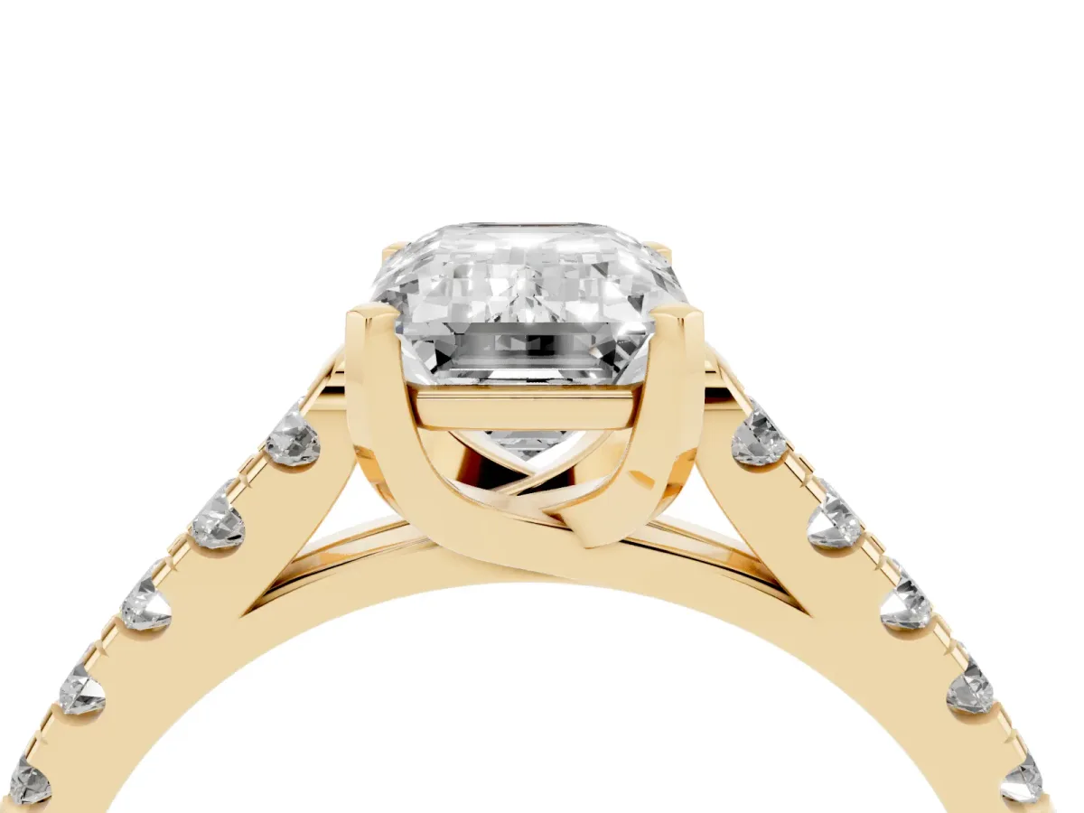 Emerald Cut Diamond Pavé Band Solitaire Ring with Prong Setting Yellow gold