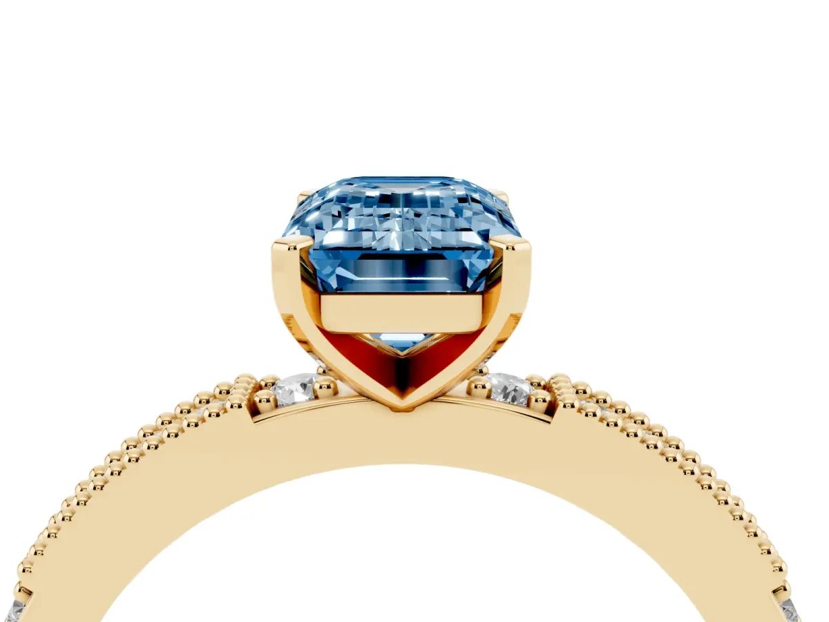 Fancy Blue Emerald Cut Solitaire with Pavé Band and Four-Prong Setting Yellow gold