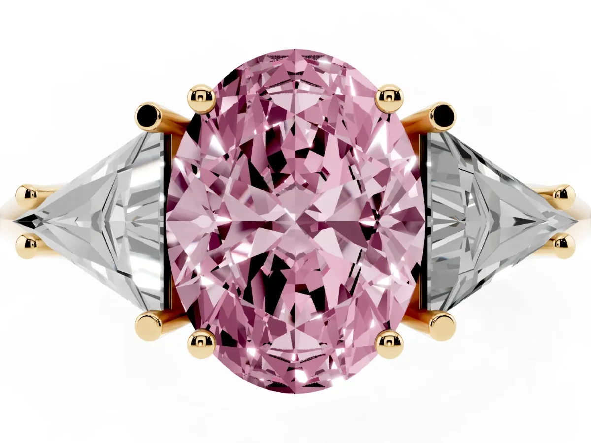 Fancy Pink Three-Stone Oval Cut Diamond Engagement Ring with Trillion Side Stones and Prong Setting Yellow gold