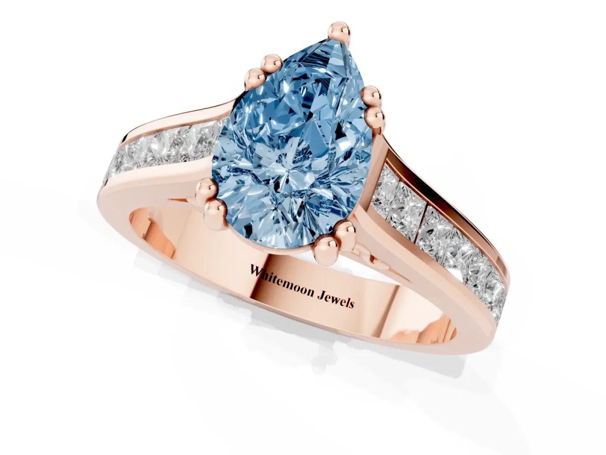 Fancy Blue Pear Cut Cut Channel Set Solitaire Engagement Ring with Prong Setting Rose gold