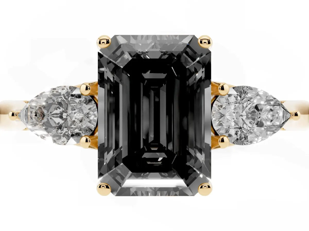 Fancy Black Emerald Cut Diamond Three-Stone Ring with Pear Side Stones and Prong Setting Yellow gold