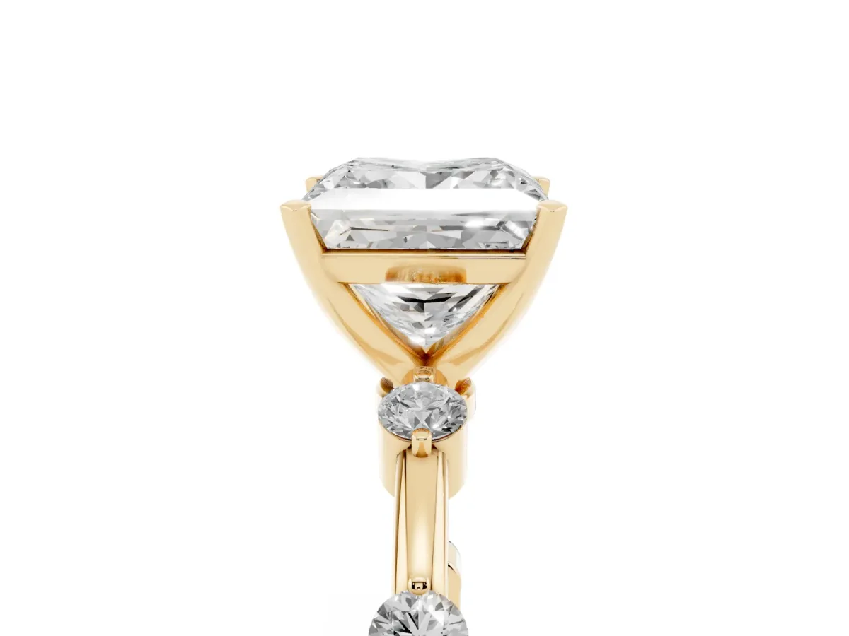 Princess Cut Solitaire Diamond Ring with Bezel Set Side Stones and Prong Setting Yellow gold