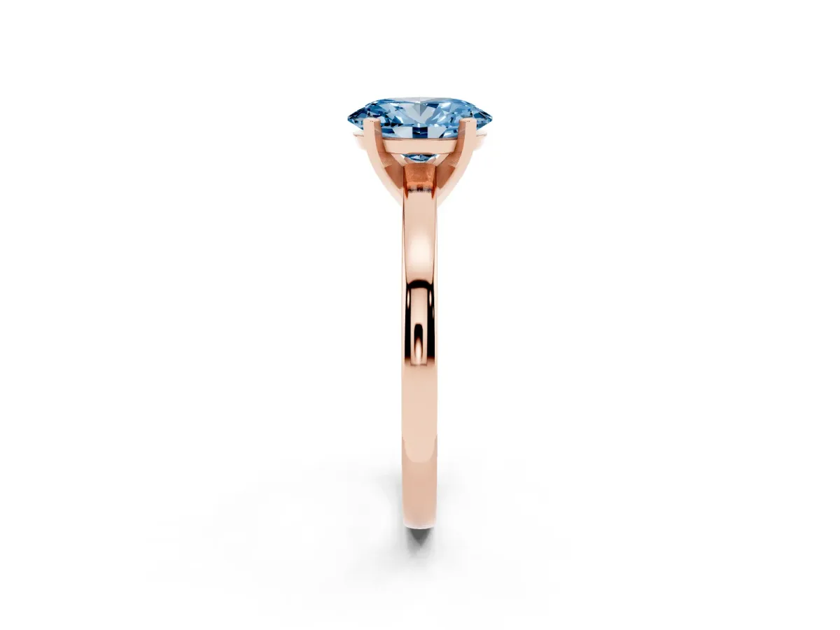 Fancy Blue Oval Cut Solitaire Diamond Engagement Ring with Four-Prong Setting on a Classic Band Rose gold