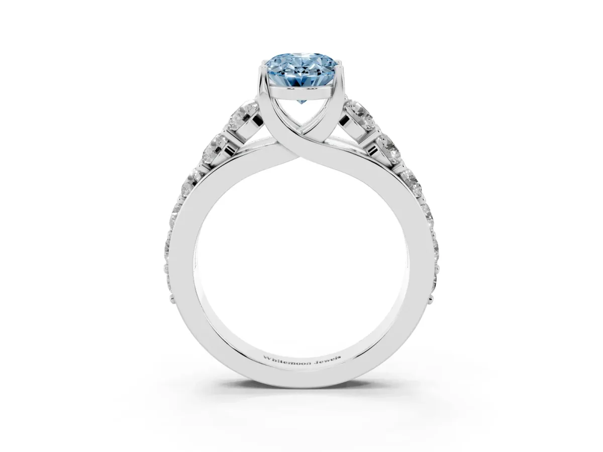 Fancy Blue Oval Cut Diamond Engagement Ring with Pavé Band and Four-Prong Setting Silver