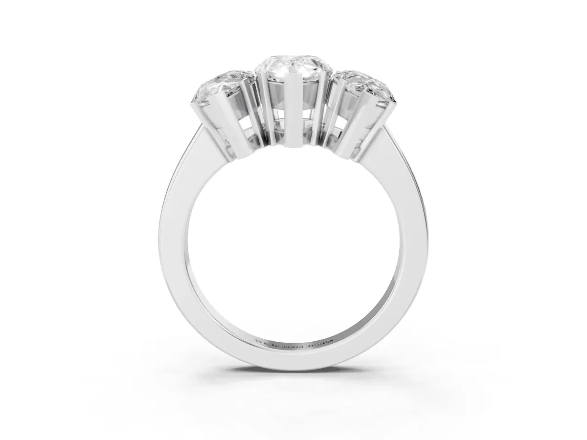 Three-Stone Pear Cut Cut Diamond Ring with Channel Set Band and Four-Prong Setting Platinum