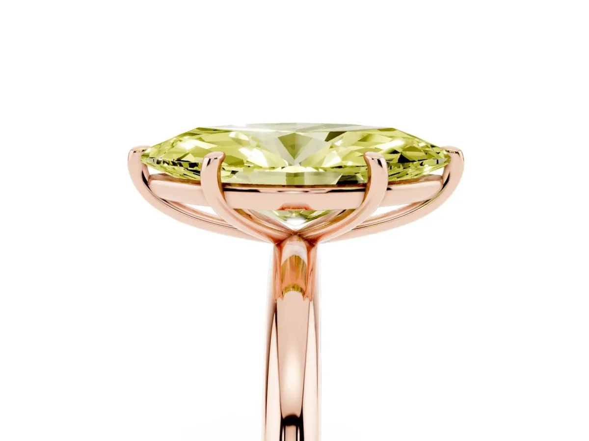 Fancy Yellow Oval Cut Solitaire Diamond Ring with Four-Prong Setting on a Plain Band Rose gold