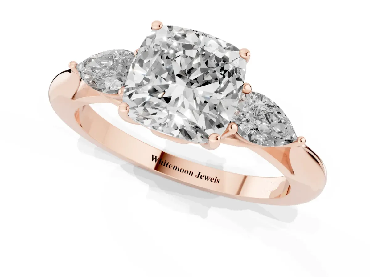 Cushion Cut Diamond Three-Stone Ring with Pear Side Stones and Prong Setting Rose gold