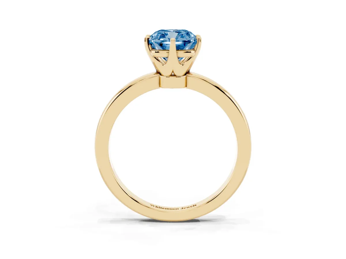Fancy Blue Cushion Cut Solitaire Diamond Ring with Six-Prong Setting on a Classic Band Yellow gold