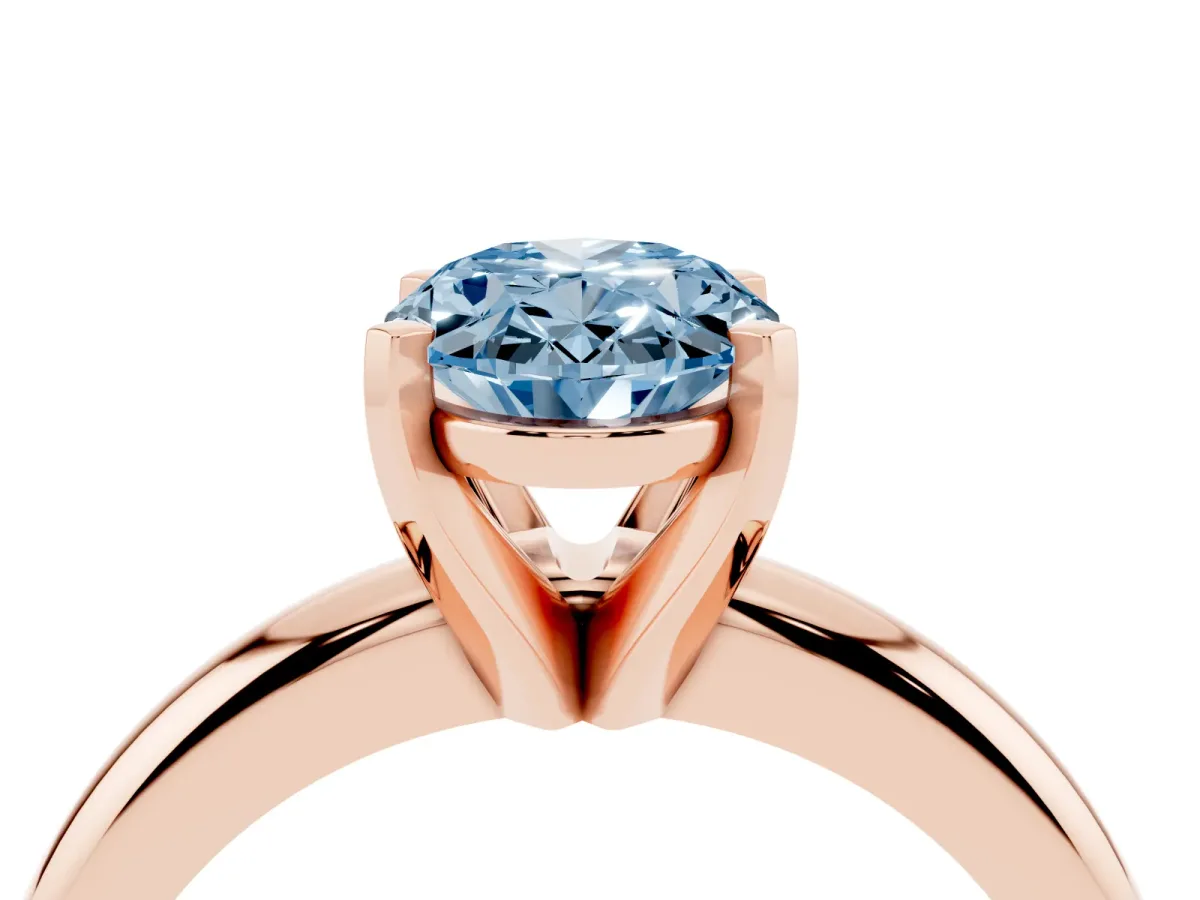 Fancy Blue Oval Cut Diamond Solitaire Engagement Ring with Round Band and Four-Prong Setting Rose gold