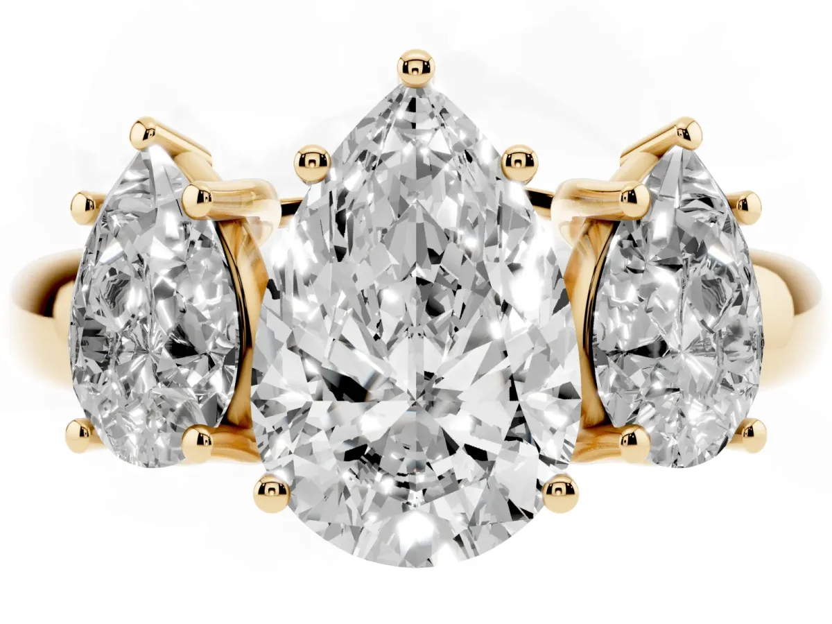 Three-Stone Pear Cut Diamond Engagement Ring with Prong Setting Yellow gold