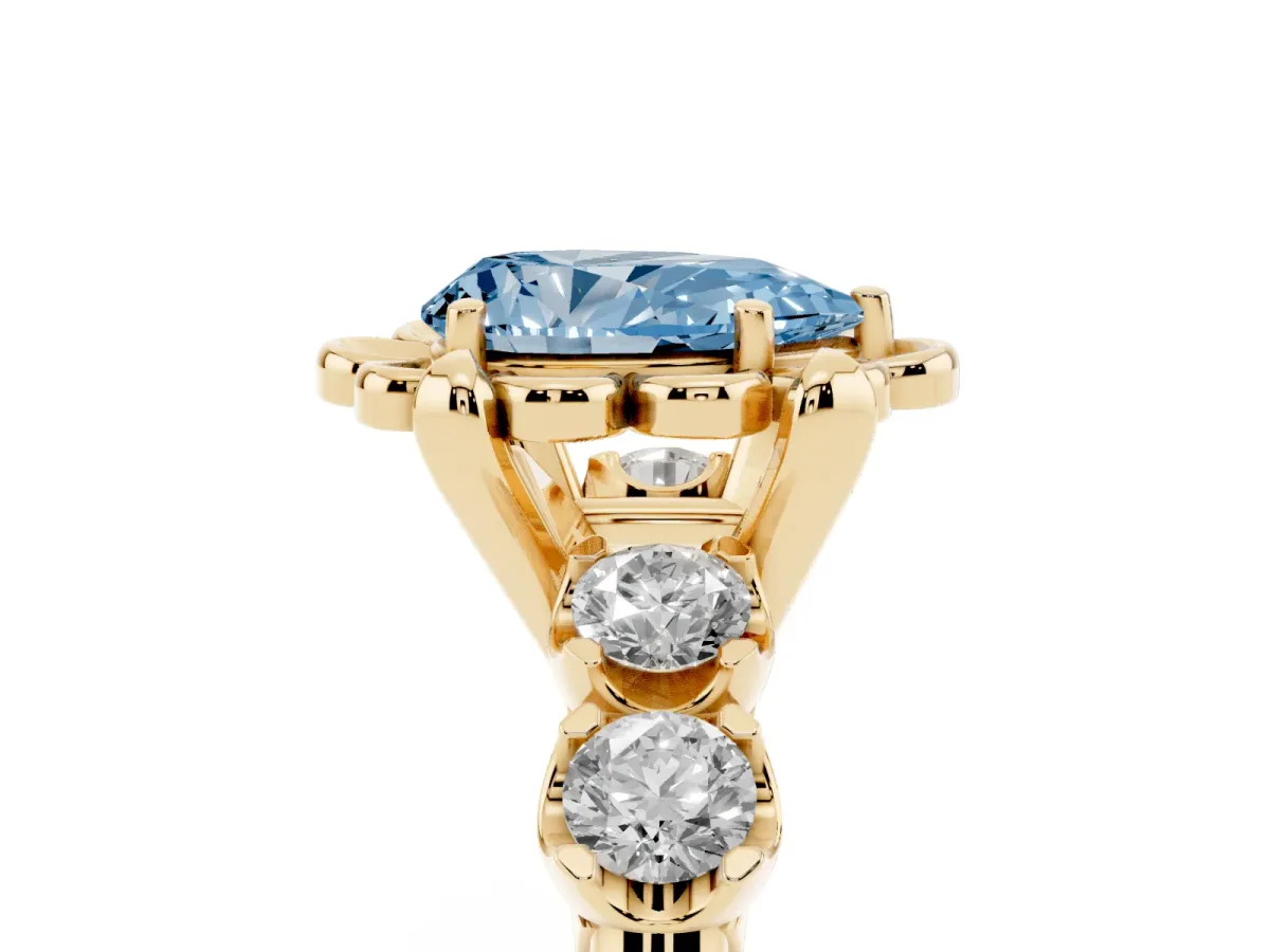 Fancy Blue Pear Cut Cut Diamond Floral Halo Engagement Ring with Shared Prong Setting Yellow gold