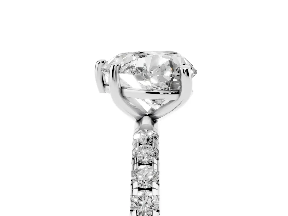 Heart Cut Cut Diamond Solitaire Ring with Micro Pave Band and Four Prong Setting Silver