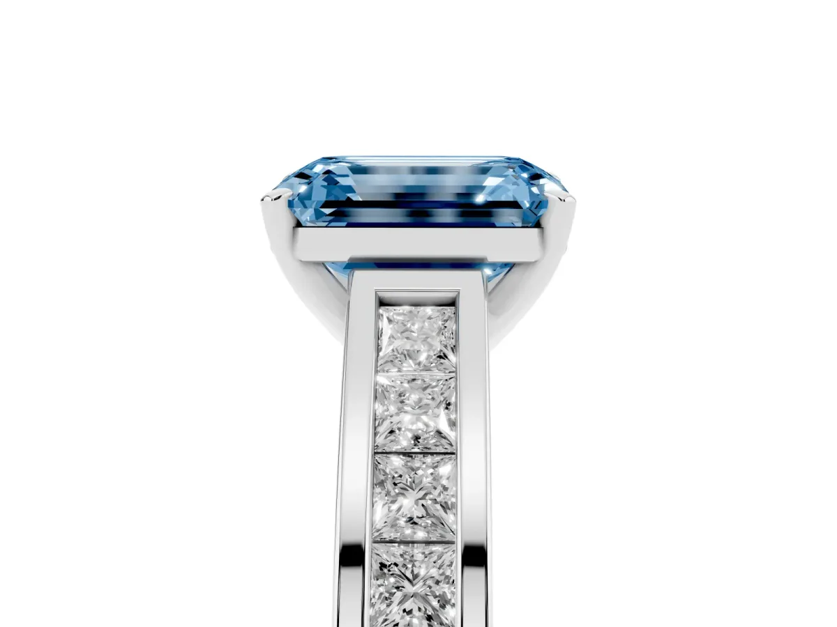Fancy Blue Emerald Cut Solitaire Diamond Ring with Channel-Set Band and Four-Prong Setting Silver