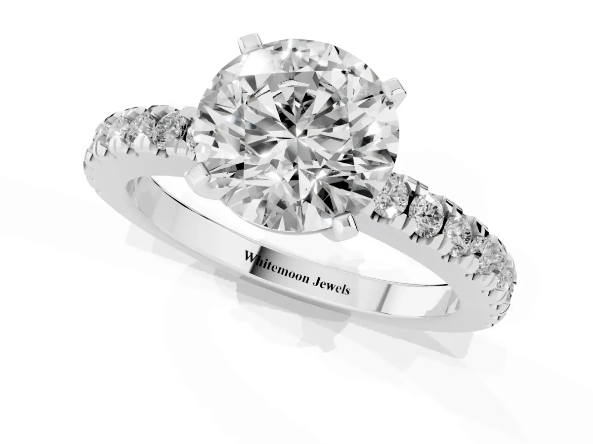 Round Cut Solitaire Diamond with Pavé Band and Four-Prong Setting Silver